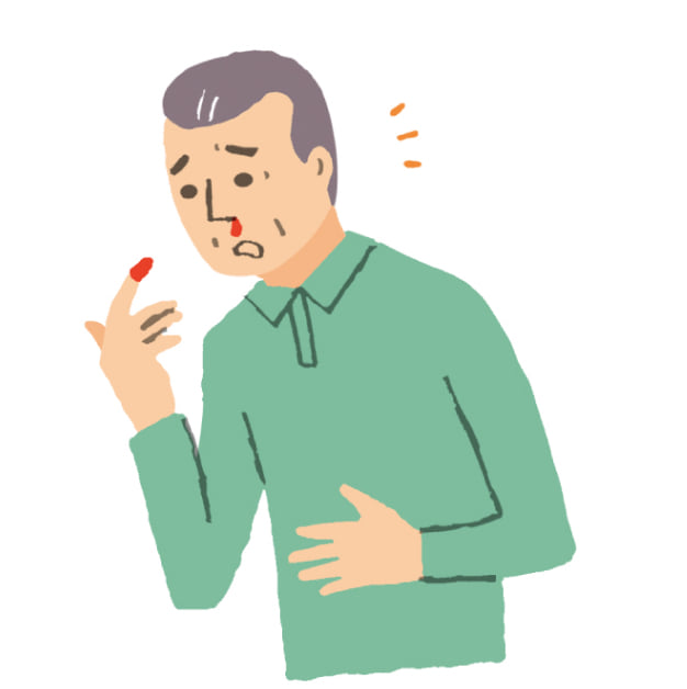 鼻血が出ている男性のイラスト